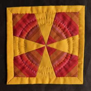Yellow & red patchwork coaster