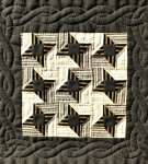 Quilted cable border around brown patchwork stars