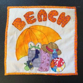 Appliqué panel for a bag.